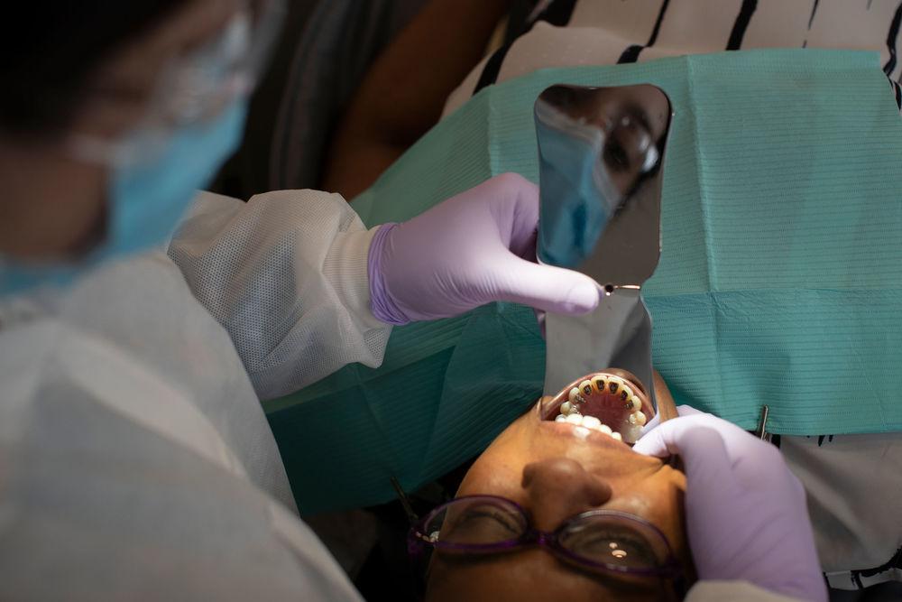 An orthodontics patient being treated in a clinic at Temple Dental.